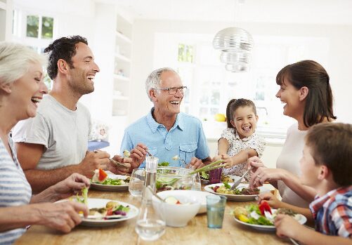 Multigenerational family enjoying meal together Multigenerational family enjoying meal together